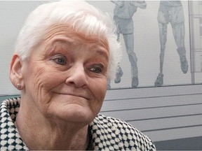 Terry Fox's mother, Betty Fox, is seen here in front of an image of her son.