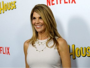 Cast member Lori Loughlin poses at the premiere for the Netflix television series "Fuller House" at The Grove in Los Angeles, California, U.S., February 16, 2016.