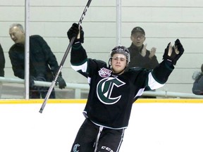 Sherwood Park Crusaders forward Carter Savoie celebrates after scoring a goal in Alberta Junior Hockey League play.