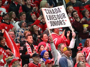 Fans cheer for Canada during the gold-medal game against Sweden during the IIHF world junior championships at KeyBank Center on Jan. 5, 2018, in Buffalo, N.Y.