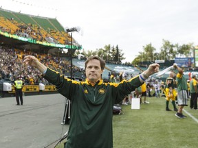 Edmonton Eskimos locker room attendant Joey Moss cheers during a CFL game between the Edmonton Eskimos and the Ottawa Redblacks at the Brick Field at Commonwealth Stadium in Edmonton on Saturday, June 25, 2016. Ian Kucerak / Postmedia