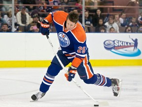 Edmonton Oilers defenceman Andy Sutton winds up during the hardest shot competition during the Oilers Skills Competition held at Rexall Place on Jan. 14, 2012.