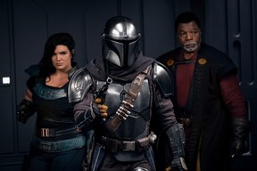 Gina Carano, Pedro Pascal and Carl Weathers in a scene from Season 2 of The Mandalorian.