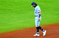 Blue Jays infielder Bo Bichette reacts after committing one of his two errors in the second inning against the Tampa Bay Rays at Tropicana Field on Wednesday..