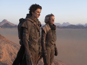Timothee Chalamet as Paul Atreides and Rebecca Ferguson as Lady Jessica Atreides in Warner Bros. Pictures and Legendary Pictures’ action adventure Dune, a Warner Bros. Pictures release.