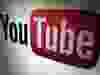 In this file photo a YouTube logo is seen during LeWeb Paris 2012 in Saint-Denis near Paris, Dec. 4, 2012.