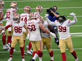 The 49ers celebrate beating the Rams on a last second field goal at SoFi Stadium in Inglewood, Calif., Sunday, Nov. 29, 2020.