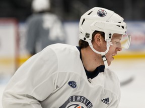 Forward Tyler Benson (49) warms up during Edmonton Oilers training camp at Rogers Place in this file photo from Sept. 18, 2019.