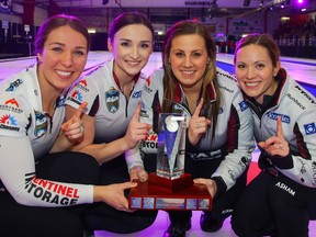 The Alberta Scotties winners - Lead,Nadine Scotland, second, Taylor McDonald, third Kate Cameron and skip Laura Walker - pose with the trophy after defeating Team Kelsey Rocque to win the Alberta Scotties Tournament of Hearts in Okotoks on Jan. 26, 2020.