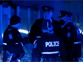 Edmonton Police Service officers investigate a shooting involving two victims at the Woodridge Condominiums near 121 Street and 146 Avenue in Edmonton, on Tuesday, Nov. 24, 2020. Photo by Ian Kucerak
