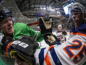 Dallas Stars right wing Corey Perry (10) fights with Edmonton Oilers defenceman Darnell Nurse (25) at the American Airlines Center on March 3, 2020, the same night the Oilers allegedly skipped out on a hotel bill in Dallas.