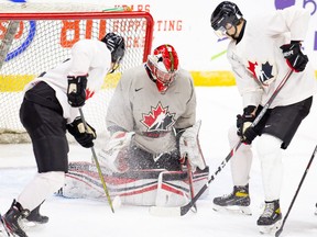 Team Canada players take part in a scrimmage at the Westerner Park Centrium in Red Deer, Alta., on Nov. 21, 2020.