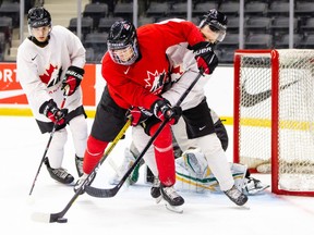 Team Canada players take part in a scrimmage at the Westerner Park Centrium in Red Deer, Alta., on Nov. 22, 2020.