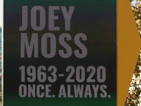 The Edmonton Football Club is holding its first-ever online 50-50 raffle in support of the Winnifred Stewart Association's Joey Moss Memorial Fund. Tickets go on sale for one day only, Nov. 22, which is the same day the 108th Grey Cup would have been played. Signs in honour of Joey Moss, the Edmonton Oilers and EE Football Club's beloved locker room attendant are seen at Commonwealth Stadium in Edmonton on Oct. 28, 2020. Moss passed away on Monday. Photo by Ian Kucerak/Postmedia