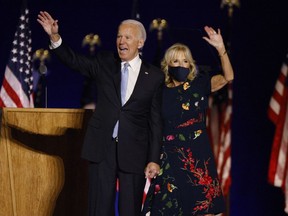 Democratic 2020 U.S. presidential nominee Joe Biden and his wife Jill wave to the crowd after speaking at his election rally, after the news media announced that Biden has won the 2020 U.S. presidential election over President Donald Trump, in Wilmington, Delaware, U.S., November 7, 2020. REUTERS/Jim Bourg ORG XMIT: BKS144