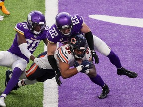 Chicago Bears running back David Montgomery dives for a TD against Minnesota.