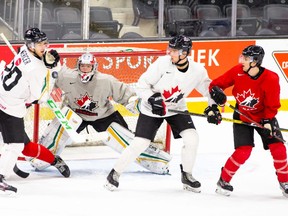 Team Canada players take part in a scrimmage at the Westerner Park Centrium in Red Deer, Alta., on Nov. 22, 2020, prior to being locked down for two weeks due to two positive COVID-19 test.