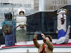 An astronaut figurine stands among the nativity scene display at the Vatican, Tuesday, Dec. 15, 2020.