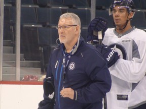 Perry Pearn, pictured here as an assistant with the Winnipeg Jets on Jan. 14, 2013, is coaching in the KHL this year.