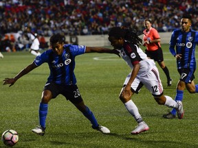 Fury FC player Andrae Campbell (12) dribbles the ball against Impact player Shamit Shome (28) during the friendly match between Fury FC and Montreal Impact held at TD Place on July 12, 2017. (James Park/Postmedia)