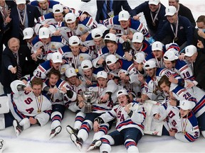 The United States team celebrates its victory over Canada during the 2021 IIHF World Junior Championship gold medal game at Rogers Place on January 5, 2021 in Edmonton, Canada.