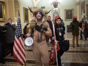 A pro-Trump mob confronts U.S. Capitol police outside the Senate chamber of the U.S. Capitol Building on January 06, 2021 in Washington, DC.