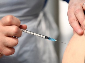 NHS staff and key workers receive the coronavirus vaccine at the Louisa Jordan Hospital on January 23, 2021 in Glasgow, Scotland.