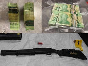A shotgun and approximately $39,000 in cash was seized by the Edmonton Police Service following a three-month long drug trafficking investigation, Jan. 8, 2021.