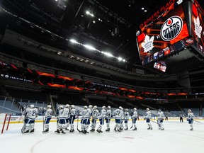 The Toronto Maple Leafs celebrate their 4-3 victory over the Edmonton Oilers at Rogers Place in Edmonton, on Thursday, Jan. 28, 2021.