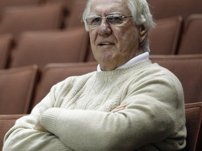 John Muckler, then-Ottawa Senators general manager, takes in a practice in Anaheim in this file photo from May 27, 2007.