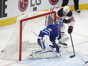 Edmonton Oilers centre Leon Draisaitl (29) scores shorthanded, beating Toronto Maple Leafs goalie Frederik Andersen (31) on a long reach during the second period in Toronto on Friday, Jan. 22, 2021.
