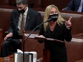 U.S. Rep. Marjorie Taylor Greene (R-GA) speaks during debate ahead of a House of Representatives vote on impeachment against U.S. President Donald Trump for his role in last week's siege of the U.S. Capitol, formally charging Trump with inciting insurrection in a speech shortly before the riot, in this frame grab from video shot inside the House Chamber of the Capitol in Washington, D.C., Wednesday, Jan. 13, 2021.