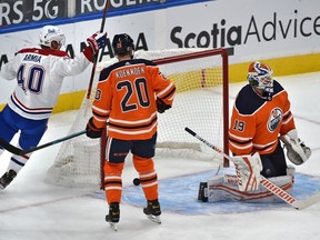 The Montreal Canadiens' Joel Armia (40) celebrates teammate Alexander Romanov's goal scored on Edmonton Oilers goalie Mikko Koskinen (19) at Rogers Place in Edmonton on Jan. 18, 2021.