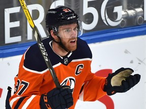 Edmonton Oilers captain Connor McDavid (97) reacts after getting called for hooking against the Montreal Canadiens at Rogers Place in Edmonton on Jan. 18, 2021