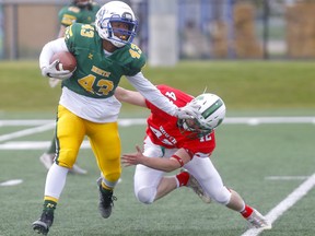 David Lezama of Team North battles Tanner Winter of Team South during Football Alberta's 30th annual Senior Bowl in Calgary in this file photo from May 20, 2019.