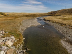 The scant waters of the Milk River flow southeastward to the Gulf of Mexico near Del Bonita, Ab., on Tuesday, October 6, 2020. Mike Drew/Postmedia