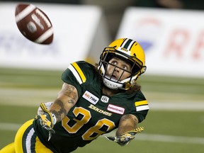 Edmonton Football Team defensive halfback Aaron Grymes (36) tracks the ball against the Saskatchewan Roughriders at Commonwealth Stadium in this file photo from Aug. 2, 2018.
