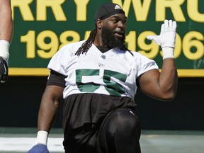 Edmonton Elks offensive tackle SirVincent Rogers stretches during training camp on May 20, 2019.