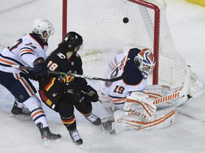 Edmonton Oilers goalie Mikko Koskinen (19) is scored on by Calgary Flames forward Mikael Backlund (not pictured) during the second period at Scotiabank Saddledome on Feb. 6, 2021.