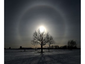 A full ringed sundog forms over a field as the sun starts to set in south Edmonton, February 26, 2021. Ed Kaiser/Postmedia