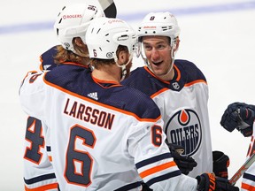 Kyle Turris (8) of the Edmonton Oilers celebrates a goal against the Toronto Maple Leafs during an NHL game at Scotiabank Arena on March 29, 2021 in Toronto. The Oilers defeated the Maple Leafs 3-2 in overtime.