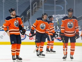 Edmonton Oilers players exit the ice after losing 6-1 to the Toronto Maple Leafs at Rogers Place in Edmonton on Wednesday, March 3, 2021.
