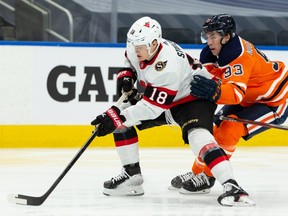Edmonton Oilers’ Ryan Nugent-Hopkins (93) chases Ottawa Senators’ Tim Stuetzle (18) during first period NHL action at Rogers Place in Edmonton, on Friday, March 12, 2021.
