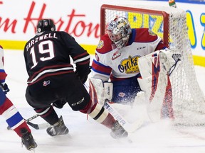 Edmonton Oil Kings goaltender Colby Knight is scored on by Red Deer Rebels’ Josh Tarzwell (19) during the second period of a WHL game at the Downtown Community Arena at Rogers Place in Edmonton, on Sunday, March 21, 2021.