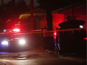 Police investigate a van in a back alley near 130 Avenue and 87 Street. The van was seen driving away from a shooting that occurred earlier in the evening on Saturday, July 23, 2016 in Edmonton.