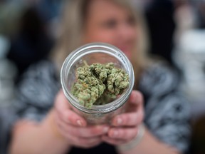 A vendor displays marijuana for sale during the 4-20 annual marijuana celebration, in Vancouver, B.C., on Friday April 20, 2018.