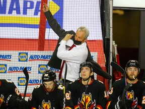 Calgary Flames head coach Darryl Sutter gets ready for the second period against the Montreal Canadiens in Calgary on March 11, 2021.
