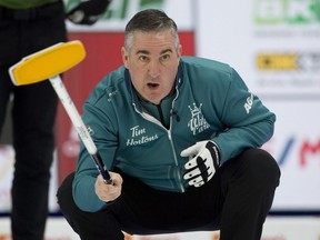 Team Wild Card 3 skip Wayne Middaugh watches as his front end bring the stone into the house during his team's game against Northern Ontario at the 2021 Tim Hortons Brier on March 11, 2021.