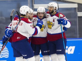 Members of the  Edmonton Oil Kings celebrate a goal against the Red Deer Rebels during second period WHL action on Friday, March 19, 2021, in Edmonton. The Oil Kings won 3-1 in Edmonton on Saturday.
