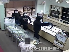 On Tuesday, Feb. 23, 2021, at approximately 5:30 p.m., three suspects wearing gloves and medical masks entered a south-side jewelry store in a shopping complex near 83 Street and 82 Avenue just before closing. (Supplied image/Edmonton Police Service)